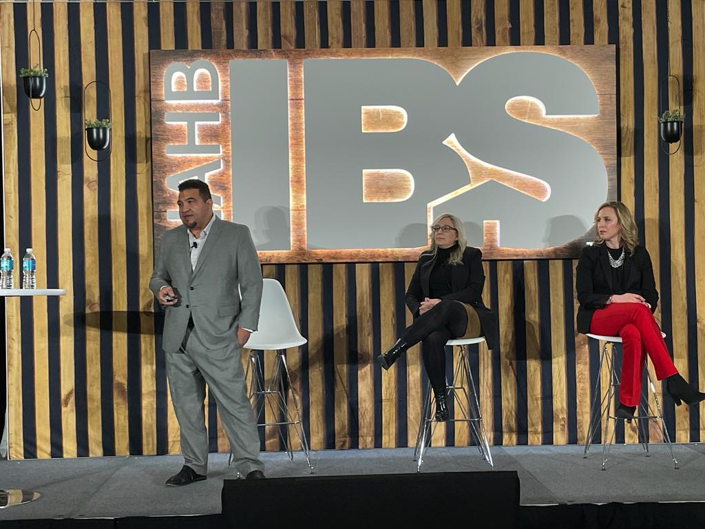 Smart Touch Interactive CEO presenting on stage at IBS 2023