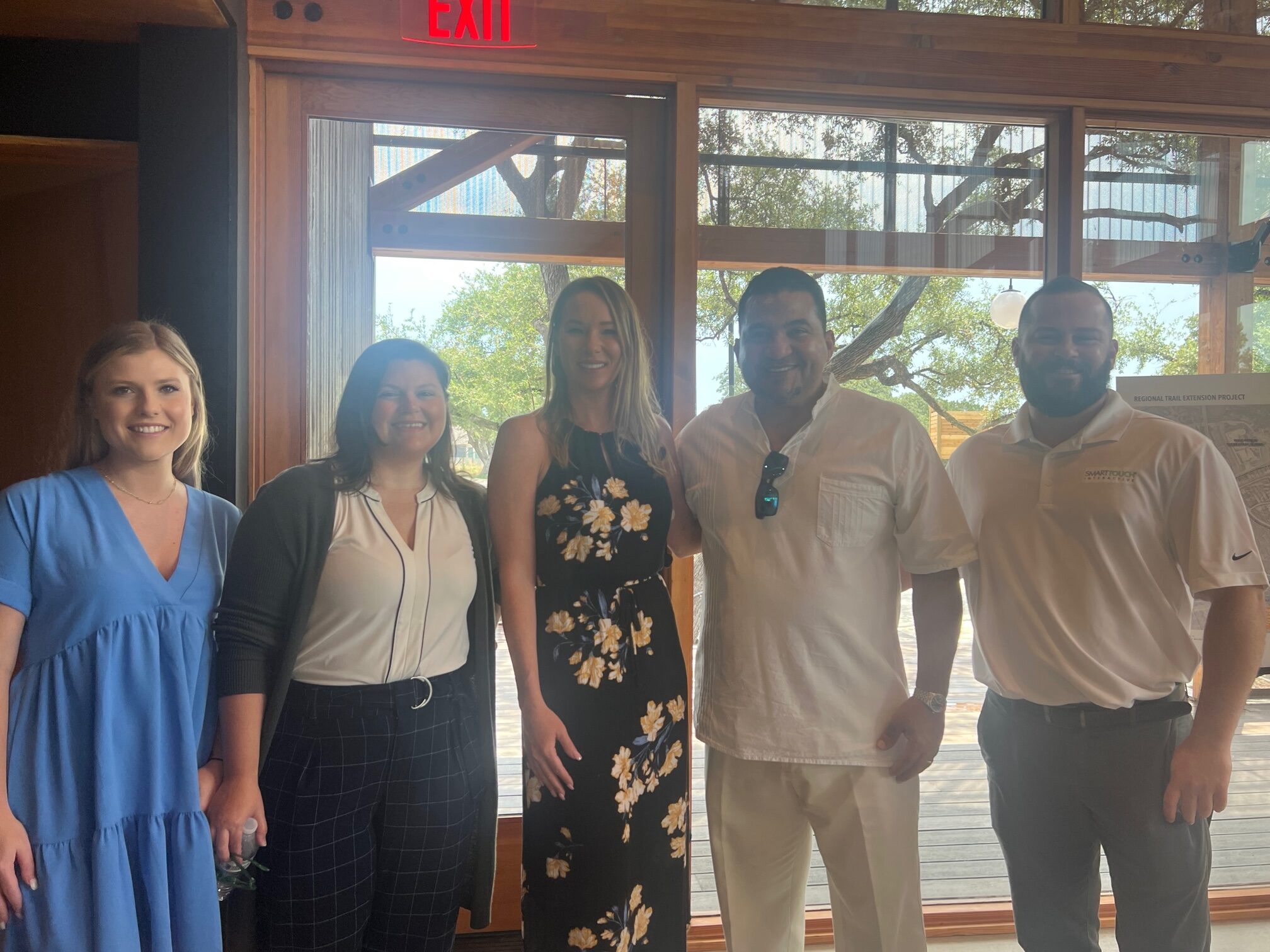 SmartTouch team visiting the indoor gym at Wolf Ranch's new amenity building